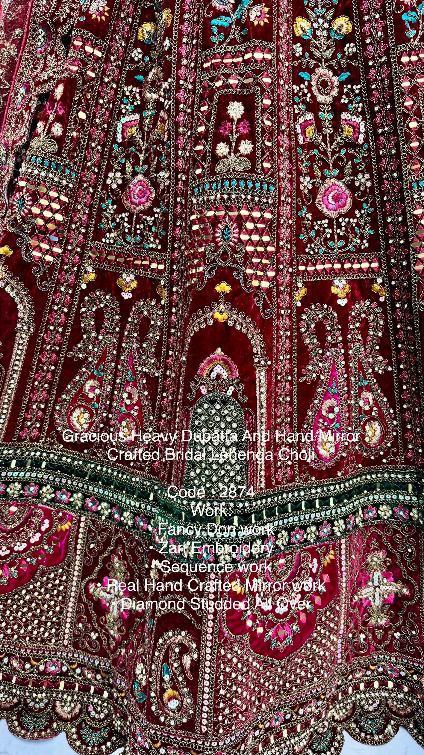 Regal Maroon Bridal Lehenga with Green & Pink Accents | Heavy Embellished Double Dupatta Set