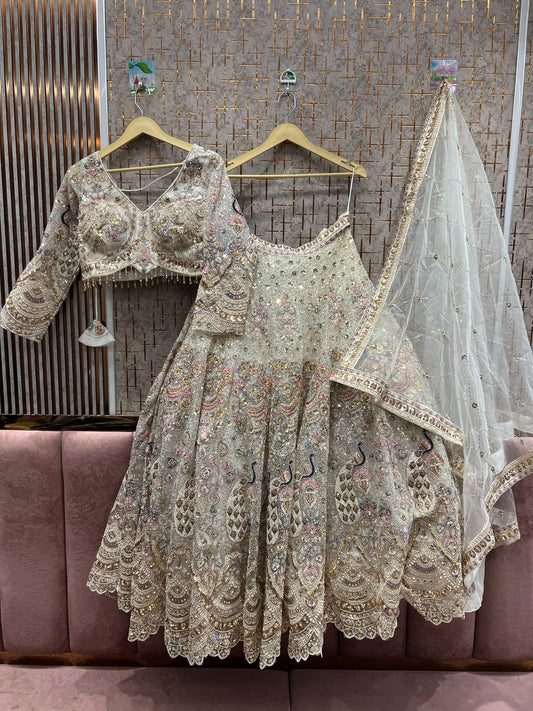 Ivory Bridal Lehenga with Pink Accents –  Embroidery, Stone & Bead Work