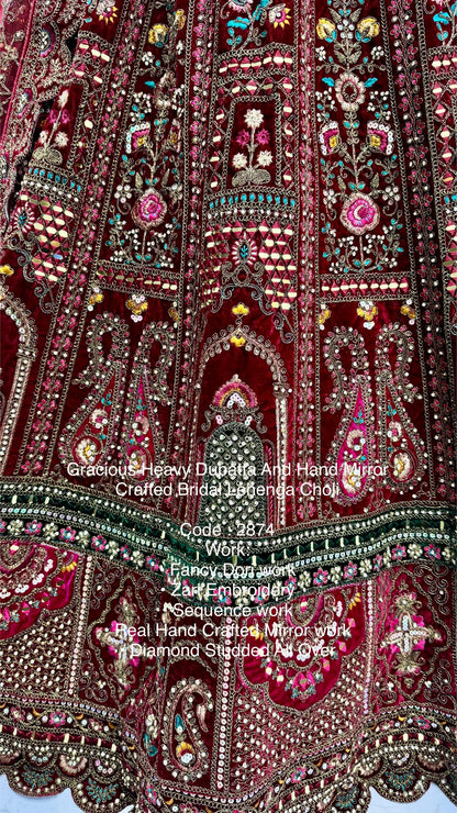 Regal Maroon Bridal Lehenga with Green & Pink Accents | Heavy Embellished Double Dupatta Set