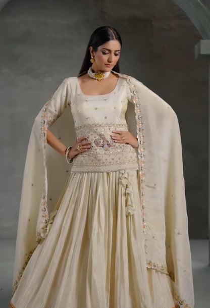 Ivory Chinon Lehenga with Peacock & Elephant Embroidery and Gold-Red Border